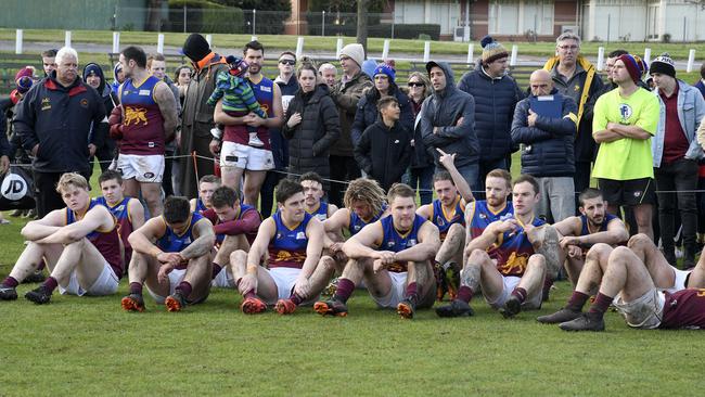 Dejected South Morang players after the Division 3 grand final. Picture: Andy Brownbill