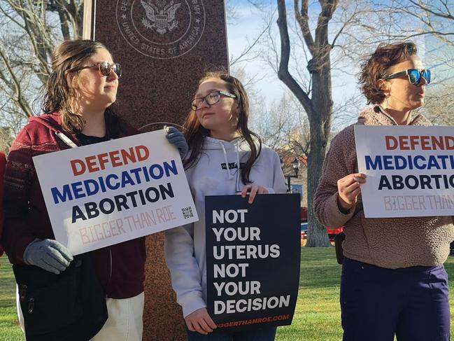 Abortion rights adovcates gather in front of the J Marvin Jones Federal Building and Courthouse in Amarillo, Texas, on March 15, 2023. - US abortion opponents are hoping for a national ban on a widely used abortion pill when their lawsuit against government drug regulators is argued Wednesday in the Texas court of a deeply conservative judge believed to be sympathetic to their cause. Galvanized after the US Supreme Court ended the nationwide right to abortion last June, anti-abortion forces are now targeting the prescription drug mifepristone in their campaign to win a total ban on the practice. (Photo by MoisÃ©s ÃVILA / AFP)