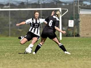 FITNESS FIGHT: Willowburn's Shannon Tyrell (left) is under an injury cloud and will be given up until today to prove her fitness for her side's grand final clash with Rockville tomorrow. Picture: Bev Lacey