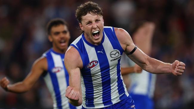 MELBOURNE, AUSTRALIA - MARCH 23: Nick Larkey of the Kangaroos celebrates a goal during the round two AFL match between North Melbourne Kangaroos and Melbourne Demons at Marvel Stadium, on March 23, 2025, in Melbourne, Australia. (Photo by Morgan Hancock/Getty Images)