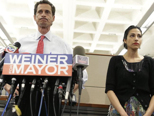 New York City mayoral candidate Anthony Weiner stands beside his wife Huma Abedin as he addresses the press about allegations of sexual text messages. Picture: AP