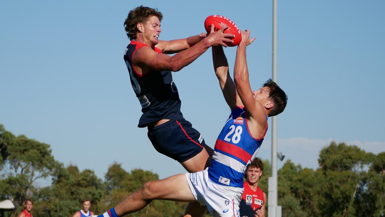 Tom Fullarton (left) flies against Footscray’s Anthony Scott in a VFL game earlier this season. Picture: Blair Jackson / NewsWire