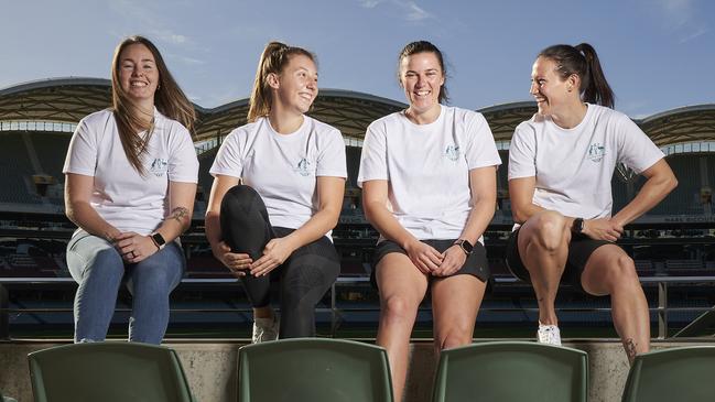 Cricketers Amanda-Jade Wellington, Darcie Brown, Tahlia McGrath, and Megan Schutt at Adelaide Oval, ahead of the Commonwealth Games in Birmingham, Friday, May 20, 2022. Picture: MATT LOXTON