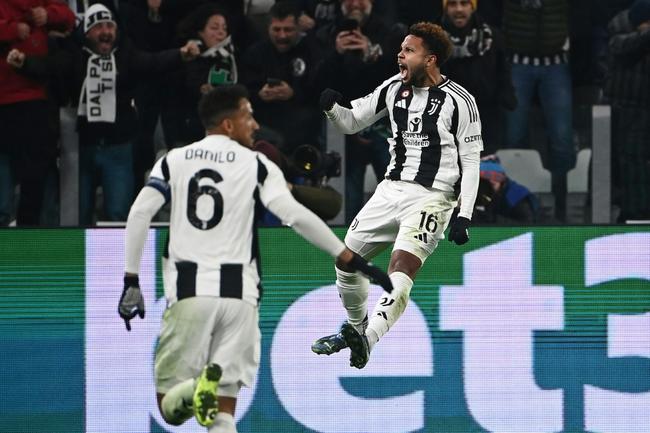 Weston McKennie (R) celebrates after scoring to give Juventus a 2-0 lead against Manchester City in Turin