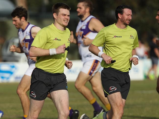 WRFL Division 1 umpires warm up before a match. Picture: Local Legends Photography