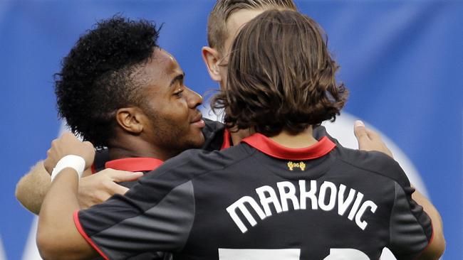 Liverpool FC forward Raheem Sterling celebrates his goal with new signing Lazar Markovic.