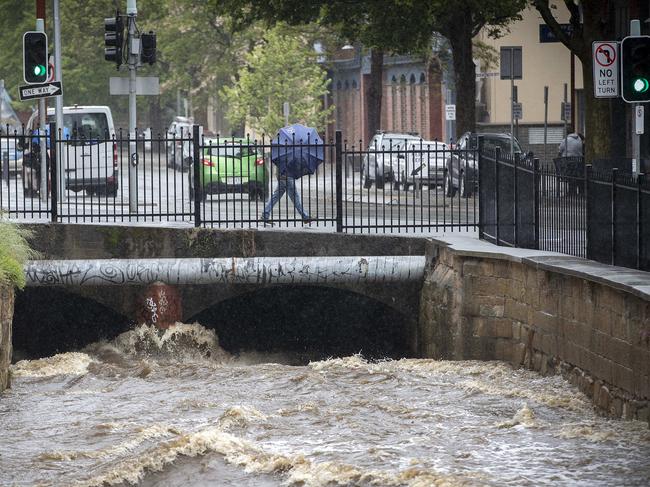 Heavy rain in Hobart. Rivulet on Collins Street. Picture: Chris Kidd