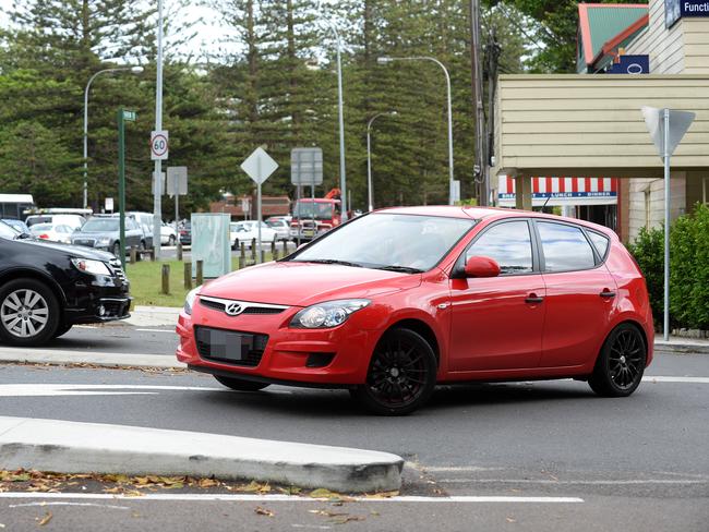 One of many drivers using the carpark exit to access Parriwi Rd. Picture: Elenor Tedenborg