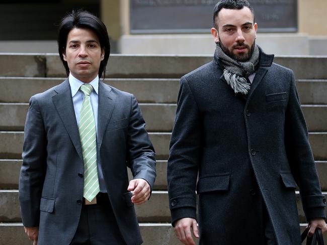 Fadi Ibrahim (left) leaves Central Local Court after applying for a change to his bail conditions. Picture: Toby Zerna