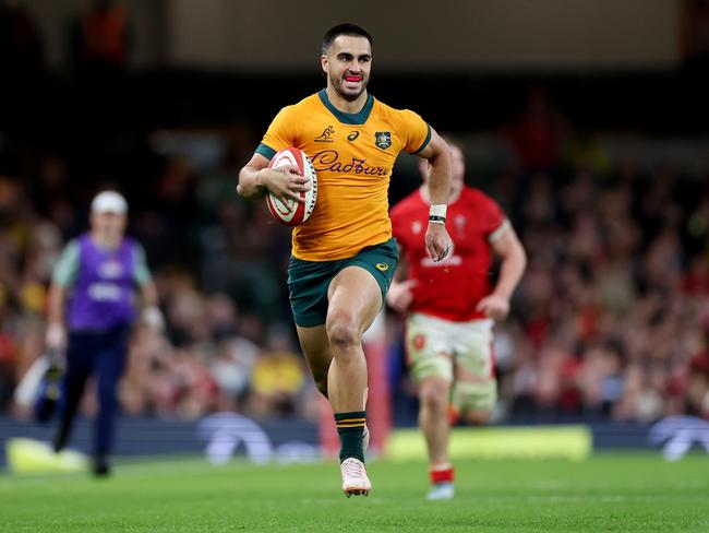 Tom Wright runs away to score for the Wallabies. Picture: Michael Steele/Getty Images