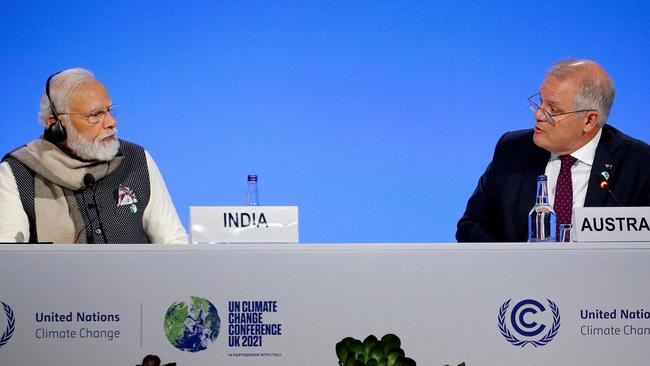 Australia's Prime Minister Scott Morrison (R) and India's Prime Minister Narendra Modi both oppose the methane pact.