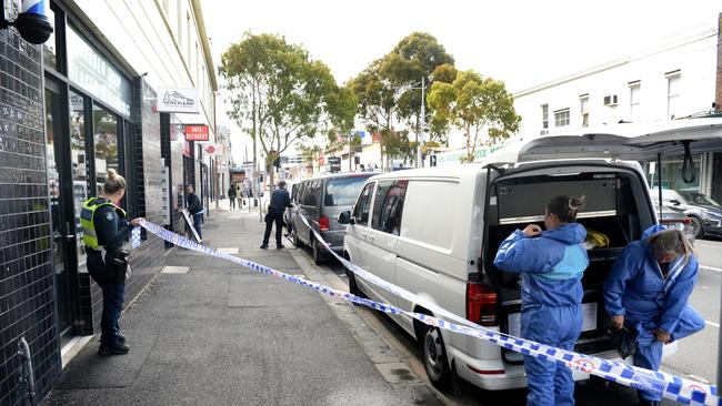 Police at the former Royal Hotel in Footscray where the victim was allegedly killed in a room that was littered with condoms and covered in blood. Picture: NCA NewsWire / Andrew Henshaw