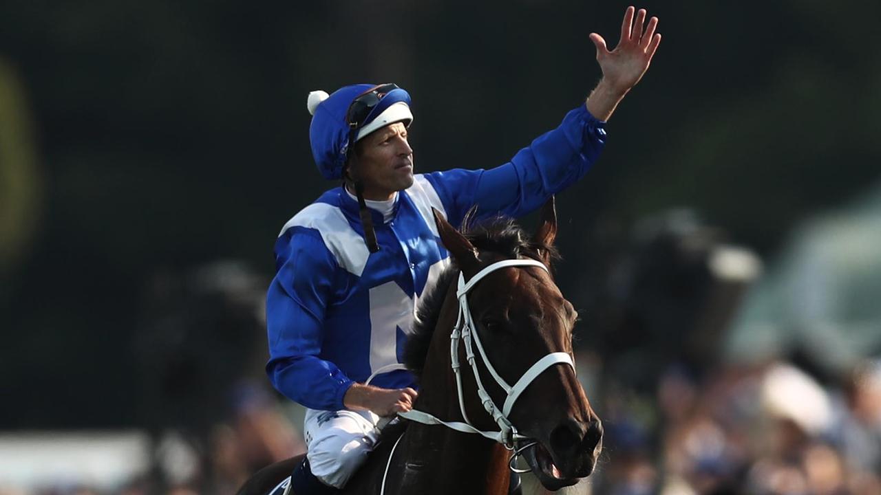 Hugh Bowman celebrates as he brings Winx back to scale after winning the Queen Elizabeth Stakes at Randwick in 2019. Picture: Mark Metcalfe / Getty Images