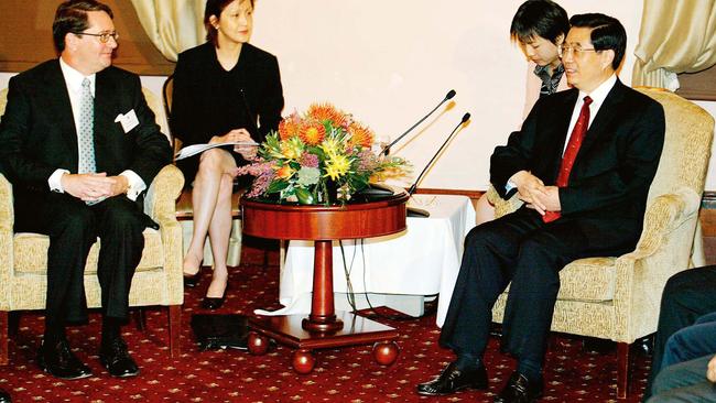 Warwick Smith meeting Hu Jintao in 2003. Picture: AFP/Greg Wood