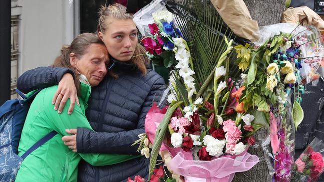 Gitta Scheenhouwer’s family at the scene of her death last year. Picture: David Crosling