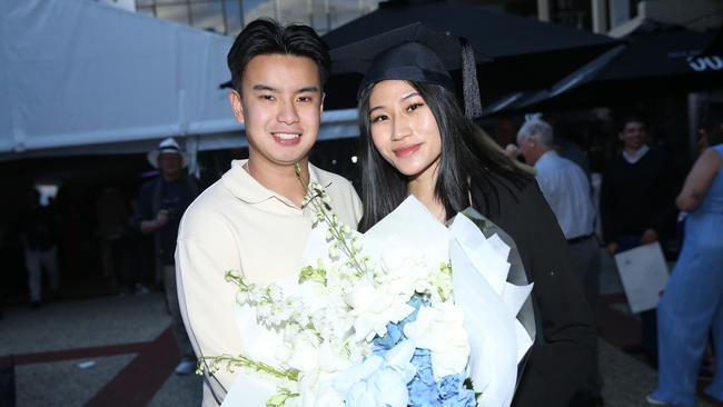 Dion Choong and Monica Lim celebrate graduation. Picture: Alan Barber