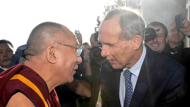 The Dalai Lama speaks to then Greens leader Bob Brown on his arrival at Parliament House in June, 2011. Picture: AAP