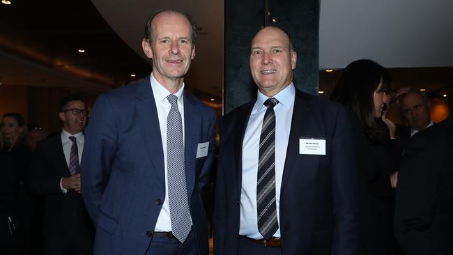 ANZ’s Shayne Elliott, left, and Covid-19 Commission boss Nev Power at the BCA Awards night. Picture: Jane Dempster