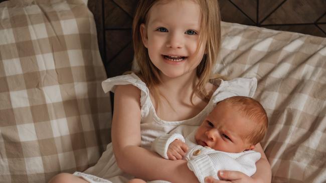 Big sister Alayna Hill with her baby brother Jasper who was diagnosed with a rare cancer about two weeks before he was born.