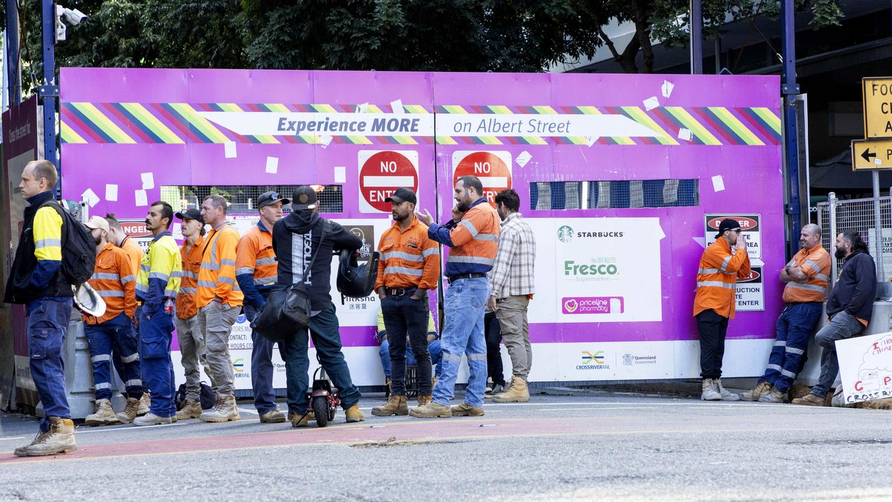 Brisbane Cross River Rail workers outside the Albert Street worksite. Picture: Richard Walker