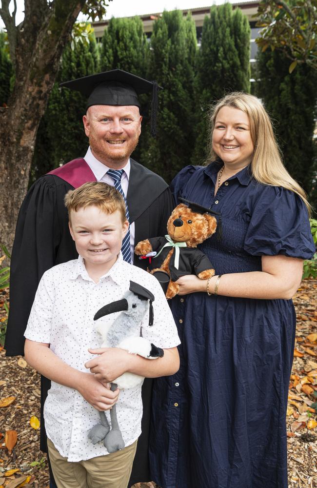 Bachelor of Engineering (Honours) graduate Adam Smith with son Aiden and wife Felicity Smith at a UniSQ graduation ceremony at The Empire, Wednesday, October 30, 2024. Picture: Kevin Farmer