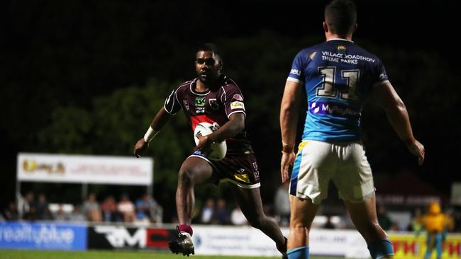Burleigh Bears player Shallin Fuller takes on the Gold Coast Titans line during a pre-season trial at Pizzey Park. February 20, 2021. Photo Jason O'Brien