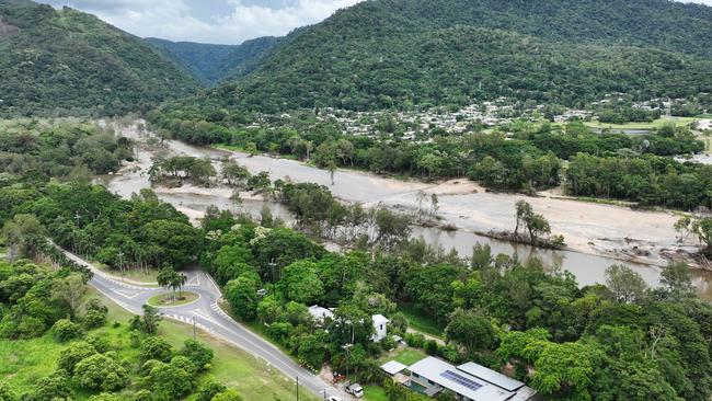 The Barron River in Cairns, Far North Queensland, reached a record flood peak, with roads closed and homes flooded in the catchment area on Sunday, December 17. Flood waters lap at the Kamerunga bridge on the Western Road, and despite the bridge remaining open, road access was cut to the northern beaches of Cairns. The record flooding was caused by ex Tropical Cyclone Jasper, which made landfall on December 13. Picture: Brendan Radke