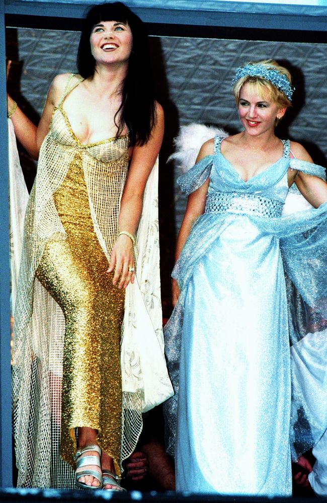 Actors Lucy Lawless and Renee O'Connor attend the 1999 parade in sparkles. Picture: Matthew Munro