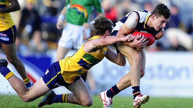 Crows youngster Alex Spina takes a strong chest mark against the Eagles. Picture: Mark Brake.