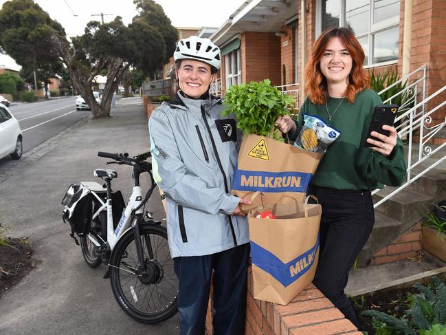 Milkrun rider Amy Farnsworth making delivery to Lauren Mason. Picture: Josie Hayden