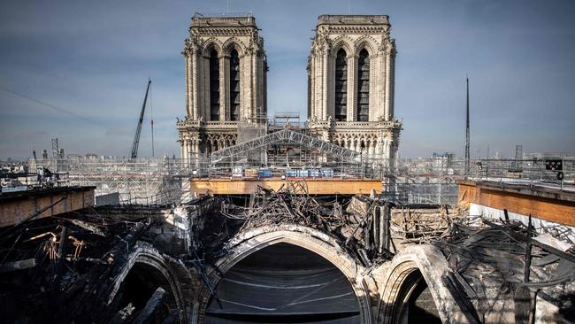 A photograph taken on November 24, 2020 in Paris shows the melted scaffolding on the roof of Notre-Dame cathedral during reconstruction works.