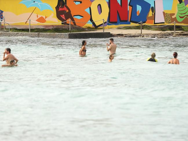 Swimmers return to Bondi Beach after it was reopened. Picture: Getty Images