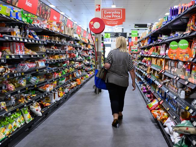 SYDNEY, AUSTRALIA - SEPTEMBER 05: An aisle of products in a Woolworths Supermarket on September 05, 2024 in Sydney, Australia. Australia is currently facing a severe cost of living crisis, with rising prices for essentials like food, housing, and utilities significantly outpacing wage growth, leaving many households struggling to make ends meet. While over 3.3 million Australians live in poverty, supermarket giants and banks are reporting record profits, highlighting a stark contrast between corporate gains and the financial hardship experienced by everyday citizens. This situation poses serious challenges across the nation, as people navigate the pressures of high inflation and inadequate support. (Photo by James Gourley/Getty Images)