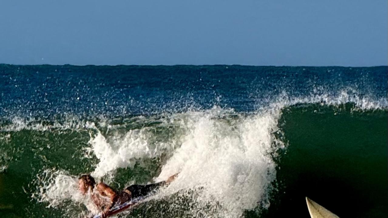 Board riders were being crunched in the big swell at Mooloolaba late Thursday afternoon as Tropical Cyclone Alfred hovered off the  Qld coastline. Photo: Mark Furler