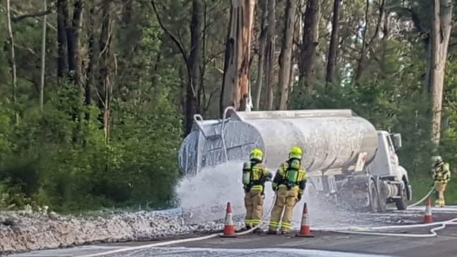 Fire and Rescue NSW crews respond to a fuel spill on Silverdale Rd after a tanker crashed. Picture: Janel Sefton