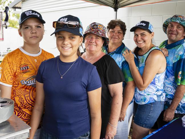 Serving ice-cold slush puppies at the Goondir Health Services Big Buddy stall are (from left) Peppa Collins, Annabell Washington, Sherilee Laine, Veronica Holland, Dionne Connolly and Firebrace Wharton at the Warriors Reconciliation Carnival women's games at Jack Martin Centre hosted by Toowoomba Warriors, Saturday, January 18, 2025. Picture: Kevin Farmer