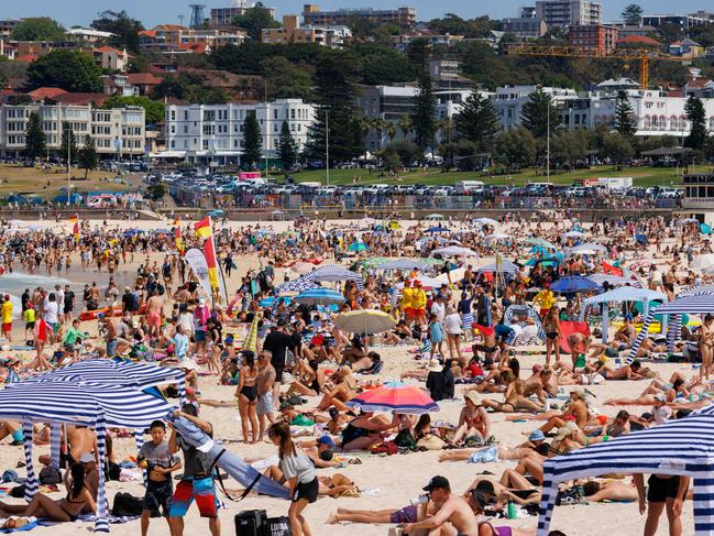 DAILY TELEGRAPH. Hot weather. Sydneysiders flocked to Bondi Beach as a spring heatwave hit this morning, bringing sweltering temps to the city. Pic shows the crowded beach. 01/10/2023. Pic by Max Mason-Hubers