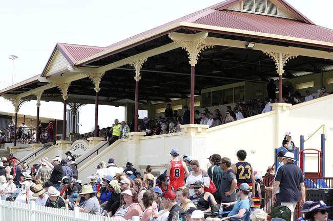 Fans pack the Memorial Oval grandstand for the JLT series clash between Crows and Port Adelaide in Port Pirie. Picture SARAH REED