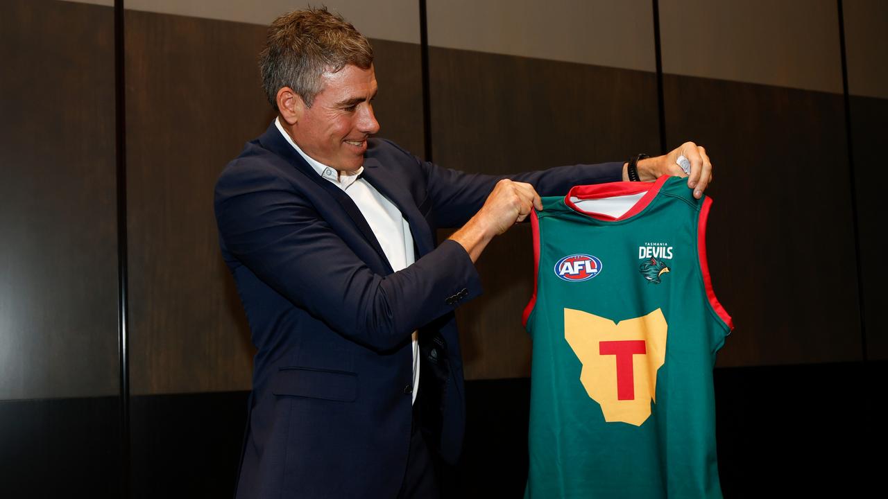 DEVONPORT, AUSTRALIA - MARCH 18: Matthew Richardson poses with The Tasmania Devils inaugural jumper during the Tasmania Football Club Launch at Paranaple Convention Centre on March 18, 2024 in Devonport, Australia. (Photo by Michael Willson/AFL Photos via Getty Images)