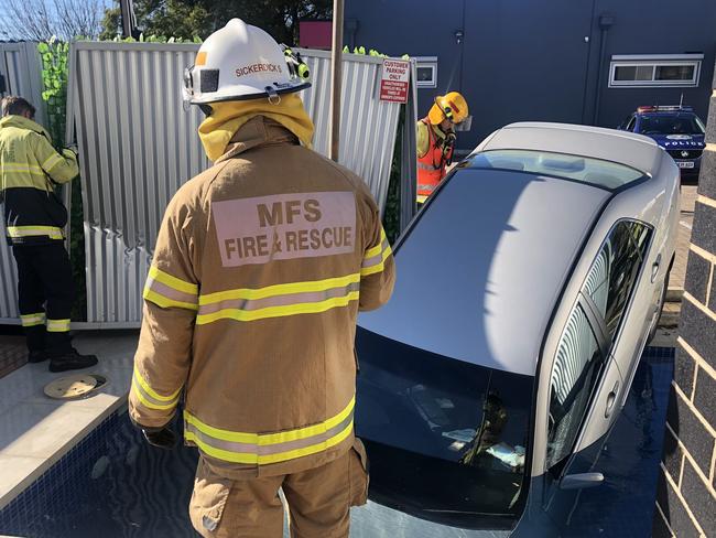 05/07/19 A woman has made a lucky escape after ploughing her car through a fence and into a pool at Glynde. Picture: Callum MacPherson/7News (@C_MacPherson7/Twitter)