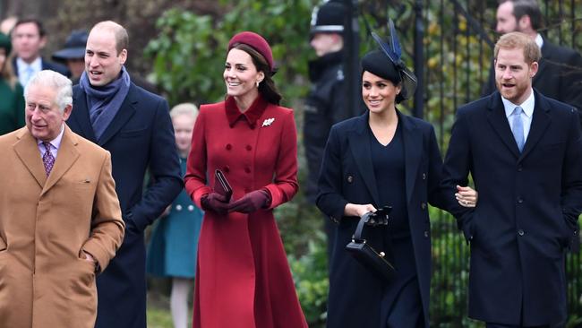 Happier days: Prince Charles, Prince William, Catherine, Duchess of Cambridge, Meghan, Duchess of Sussex and Prince Harry arrive for the royal family's traditional Christmas Day service at St Mary Magdalene Church in Sandringham, in 2018.