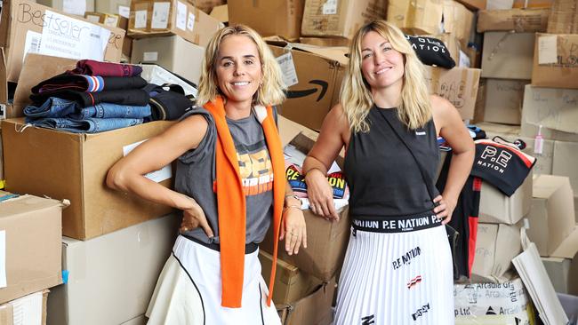 P.E. Nation Co-Founders Pip Edwards and Claire Tregoning at Thread Together in Banksmeadow where they have committed to donate clothing for bushfire-effected areas. Picture: Tim Hunter