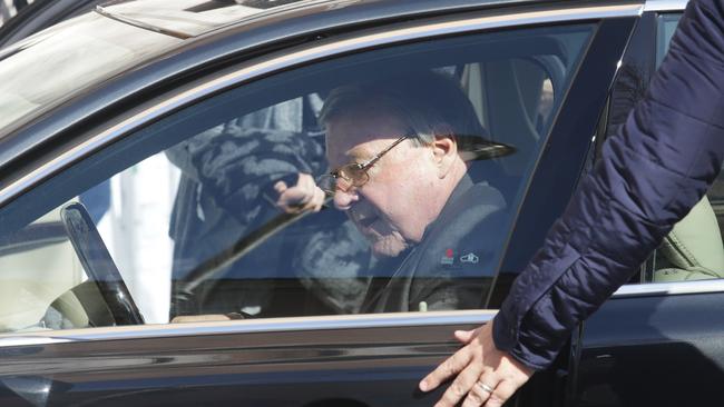 Cardinal George Pell leaves his home near the Vatican and gets in his car. Picture: Ella Pellegrini