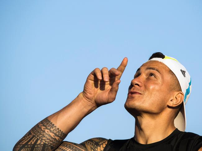 New Zealand All Blacks rugby player Sonny Bill Williams gestures as he is introduced to staff at the Adidas Creative Place ahead of the Olympic Games in Rio de Janeiro on August 4, 2016. / AFP PHOTO / Odd ANDERSEN