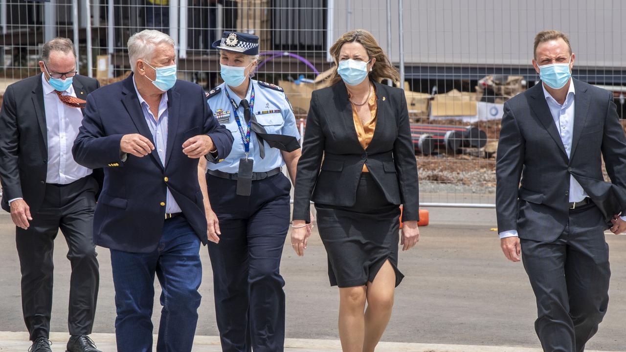 John Wagner with Annastacia Palaszczuk and Steven Miles. Queensland Premier Annastacia Palaszczuk and Deputy Premier Steven Miles visit the Wellcamp quarantine hub. Wednesday, February 16, 2022. Picture: Nev Madsen.