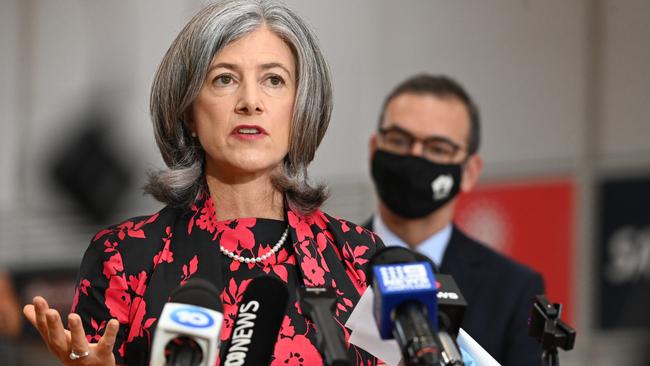 SA chief health officer, Nicola Spurrier talks to the press with then Premier Steven Marshall in the background. Critics say he spent way too much time there. Picture: Naomi Jellicoe