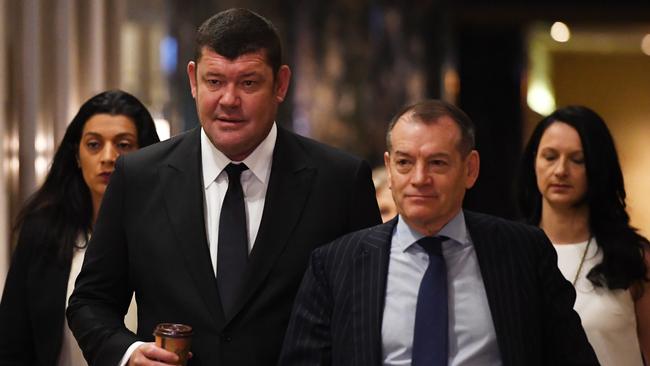 Crown Resorts director James Packer and executive chairman John Alexander arrive to attend the annual general meeting. Picture: AAP