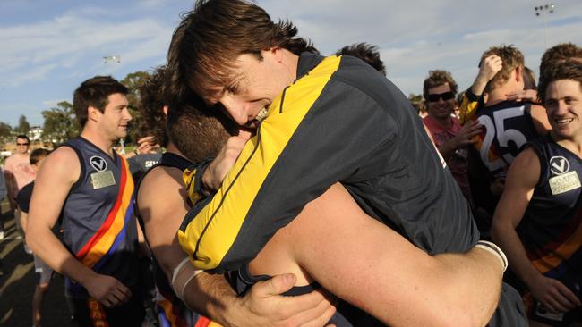 Luke Beveridge celebrates coaching St Bedes to a VAFA Grand Final win over Collegians.