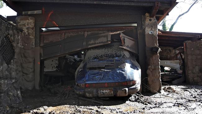 A damaged in the garage of a home consumed by the mudslide. Picture: AFP.