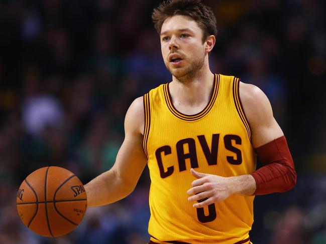 BOSTON, MA - DECEMBER 15: Matthew Dellavedova #8 of the Cleveland Cavaliers carries the ball against the Boston Celtics during the second quarter at TD Garden on December 15, 2015 in Boston, Massachusetts. NOTE TO USER: User expressly acknowledges and agrees that, by downloading and/or using this photograph, user is consenting to the terms and conditions of the Getty Images License Agreement. (Photo by Maddie Meyer/Getty Images)